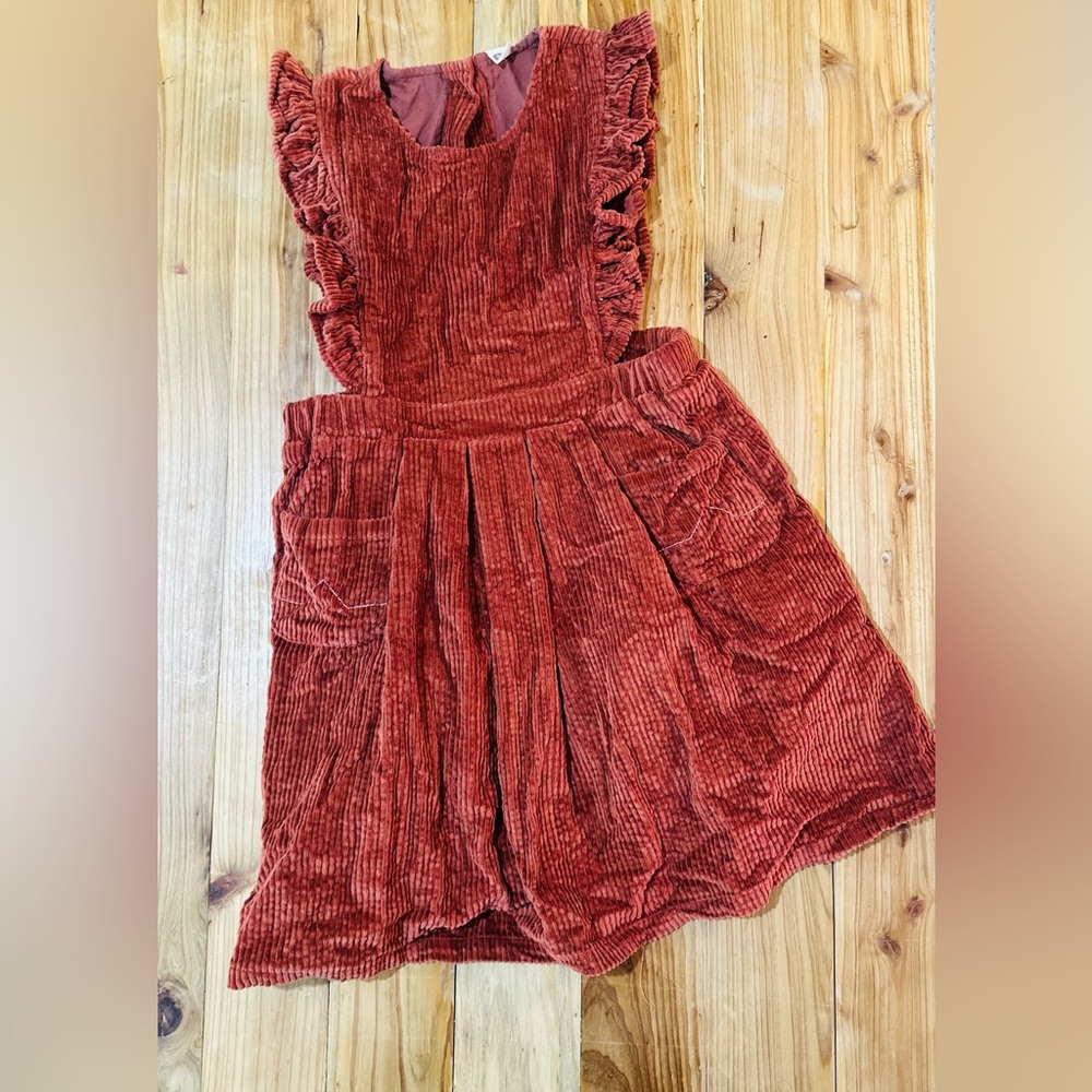 Soft corduroy girls jumper dress. Size 8 - rust terracotta